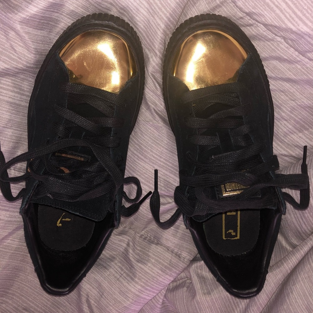 Black and gold Fenty puma